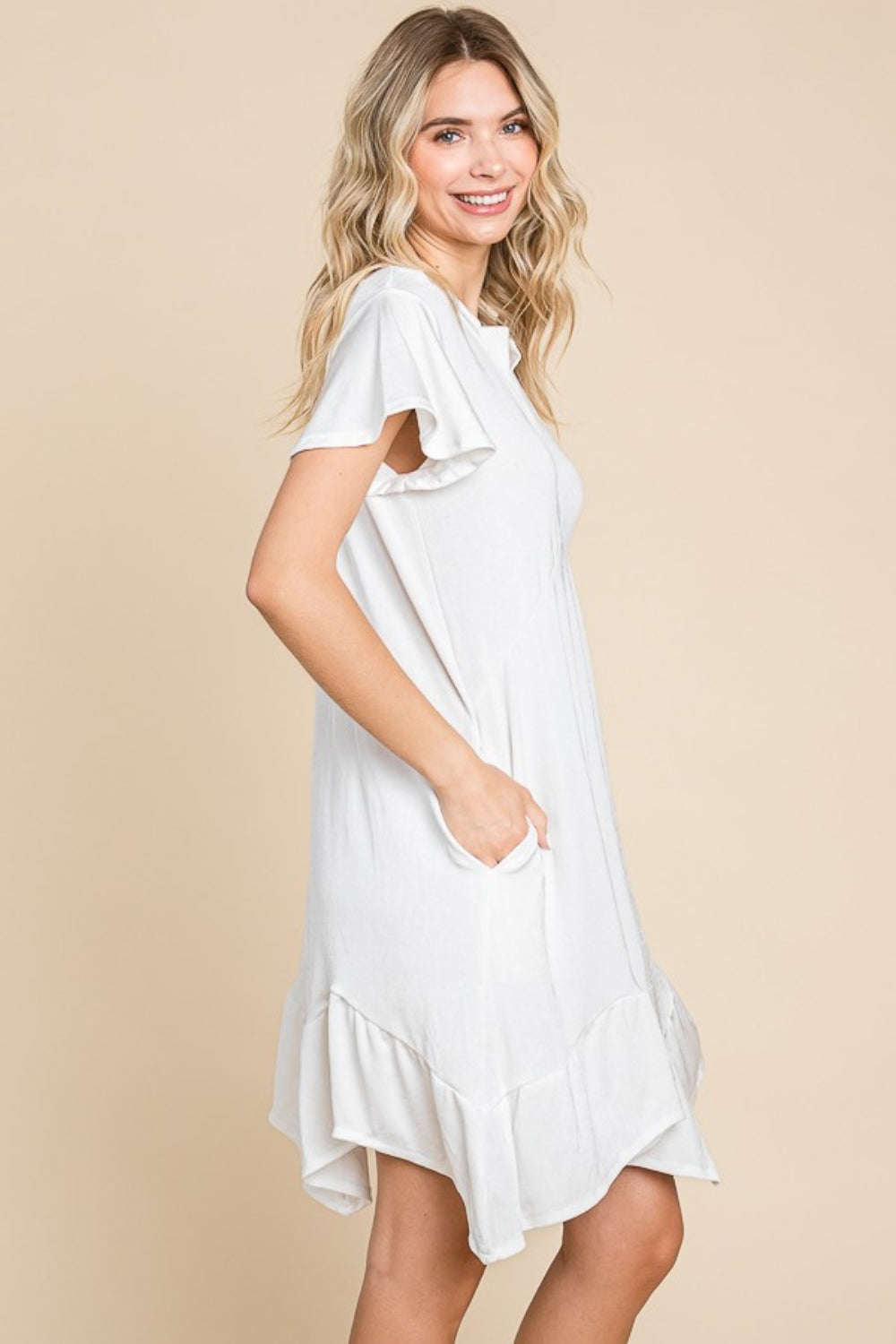 A Girl's Favorite Ruffled Asymmetric Hem Dress in Soft White