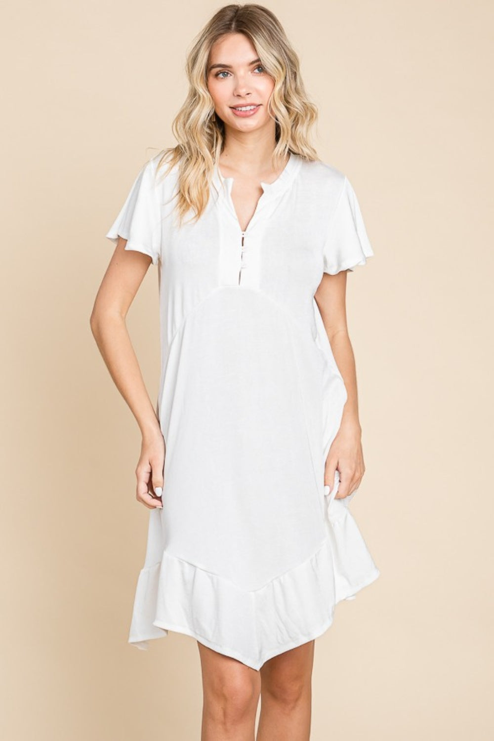 A Girl's Favorite Ruffled Asymmetric Hem Dress in Soft White