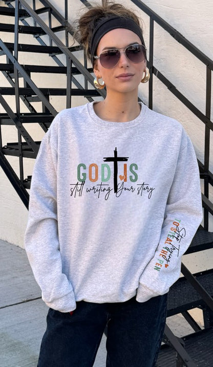 God is Still Writing Your Story graphic Sweatshirt