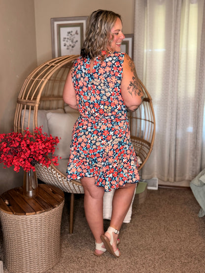 Meadow Mischief Sleeveless Romper in Navy/Orange/Teal