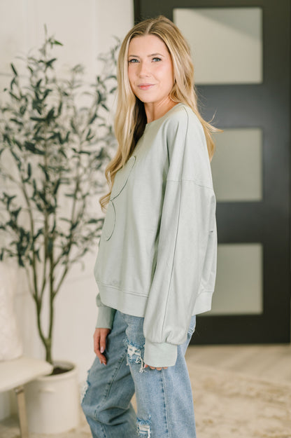 Petal Poise Floral Applique Pullover in Ivy